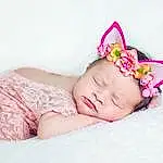 Enfant, Rose, Photograph, Hair Accessory, Baby, Headpiece, Headband, Crown, Headgear, Fashion Accessory, Bambin, Photography, Sweetness, Costume Accessory, Baby Sleeping, Baby & Toddler Clothing, Oreille, Portrait Photography, Personne, Headwear