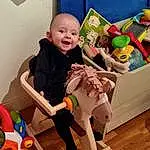 Sourire, Baby Playing With Toys, Jouets, Yellow, Happy, Bambin, Fun, Leisure, Comfort, Baby & Toddler Clothing, Enfant, Baby, Nursery, Infant Bed, Baby Products, Play, Baby Toys, Room, Recreation, Assis, Personne
