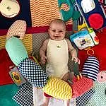 Yellow, Jouets, Baby, Comfort, Enfant, Bambin, Thigh, Pattern, Chapi Chapo, Baby Products, Stuffed Toy, Fun, Lap, Baby Toys, Play, Room, Baby & Toddler Clothing, Leisure, Art, Personne, Joy