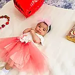 Flash Photography, Sleeve, Baby & Toddler Clothing, Happy, Petal, Rose, Dress, Baby, Bambin, Red, Headpiece, Magenta, Embellishment, Bridal Accessory, Event, Wedding Ceremony Supply, Fun, Enfant, Linens, Personne, Headwear