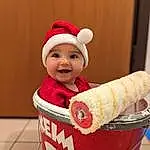 Sourire, Sleeve, Happy, Headgear, Baby & Toddler Clothing, Baby, Cap, Bambin, NoÃ«l, Costume Hat, Holiday, Fictional Character, Enfant, Christmas Eve, Carmine, Baby Laughing, Santa Claus, Junk Food, Laugh, Comfort Food, Personne, Joy, Headwear