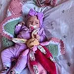 Hand, Jouets, Doll, Purple, Rose, Eyelash, Violet, Magenta, Linens, Jewellery, Stuffed Toy, Pattern, Embellishment, Fashion Accessory, Peach, Peluches, Baby Products, Crochet, Art, Wool, Personne, Headwear